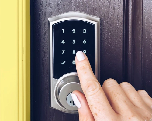 CSI Security technician installing an electronic access control system.